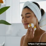 Home 14 천연화장품 스킨케어 루틴 - A serene young woman, in her early 20s, with clear, fresh skin, gently massaging a natural cleansing...